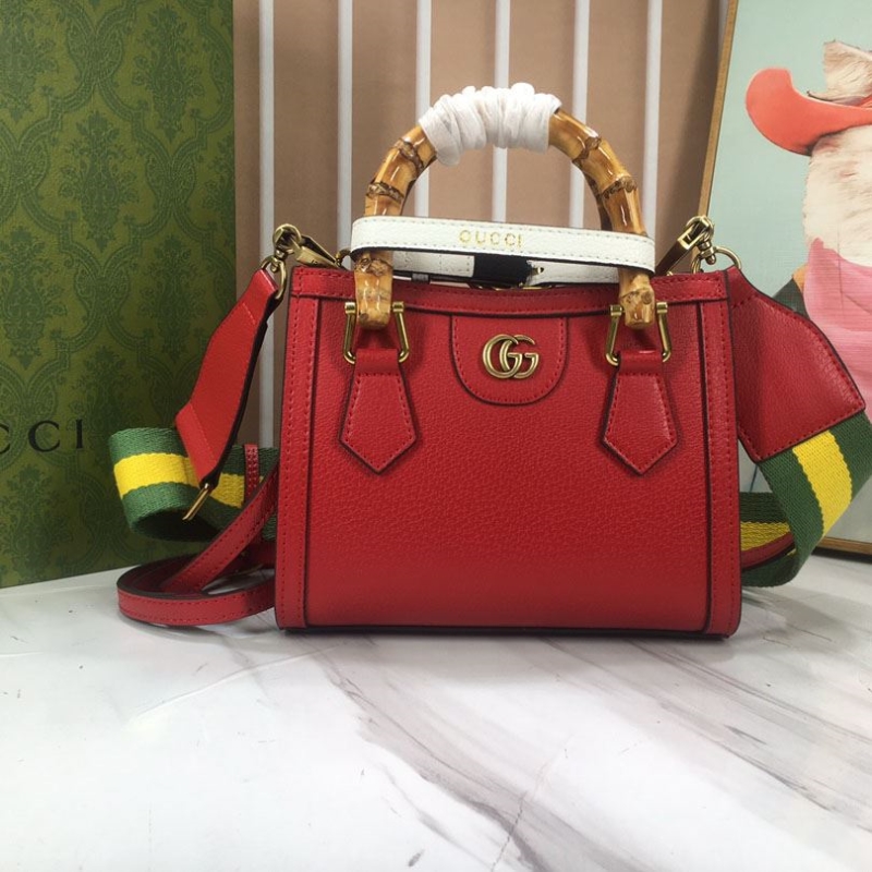 G*u*i top handle bags
